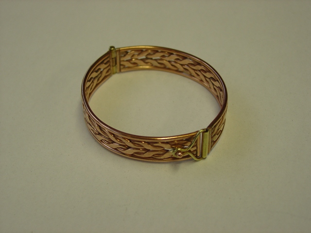 Hinged copper and brass bangle