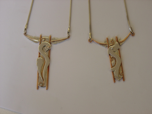 Long silver and copper pendants