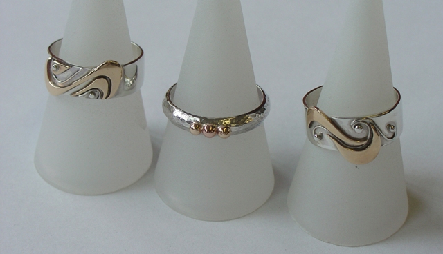 Silver and gold rings