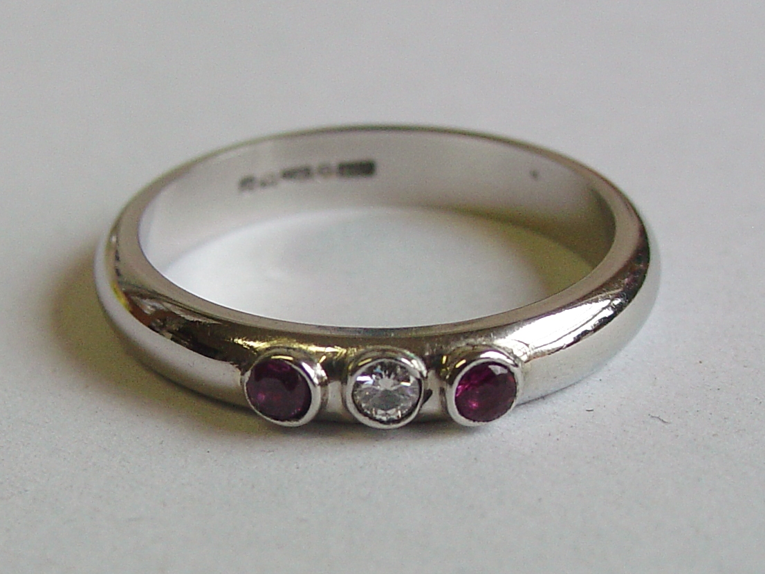 Platinum, diamond and sapphire ring