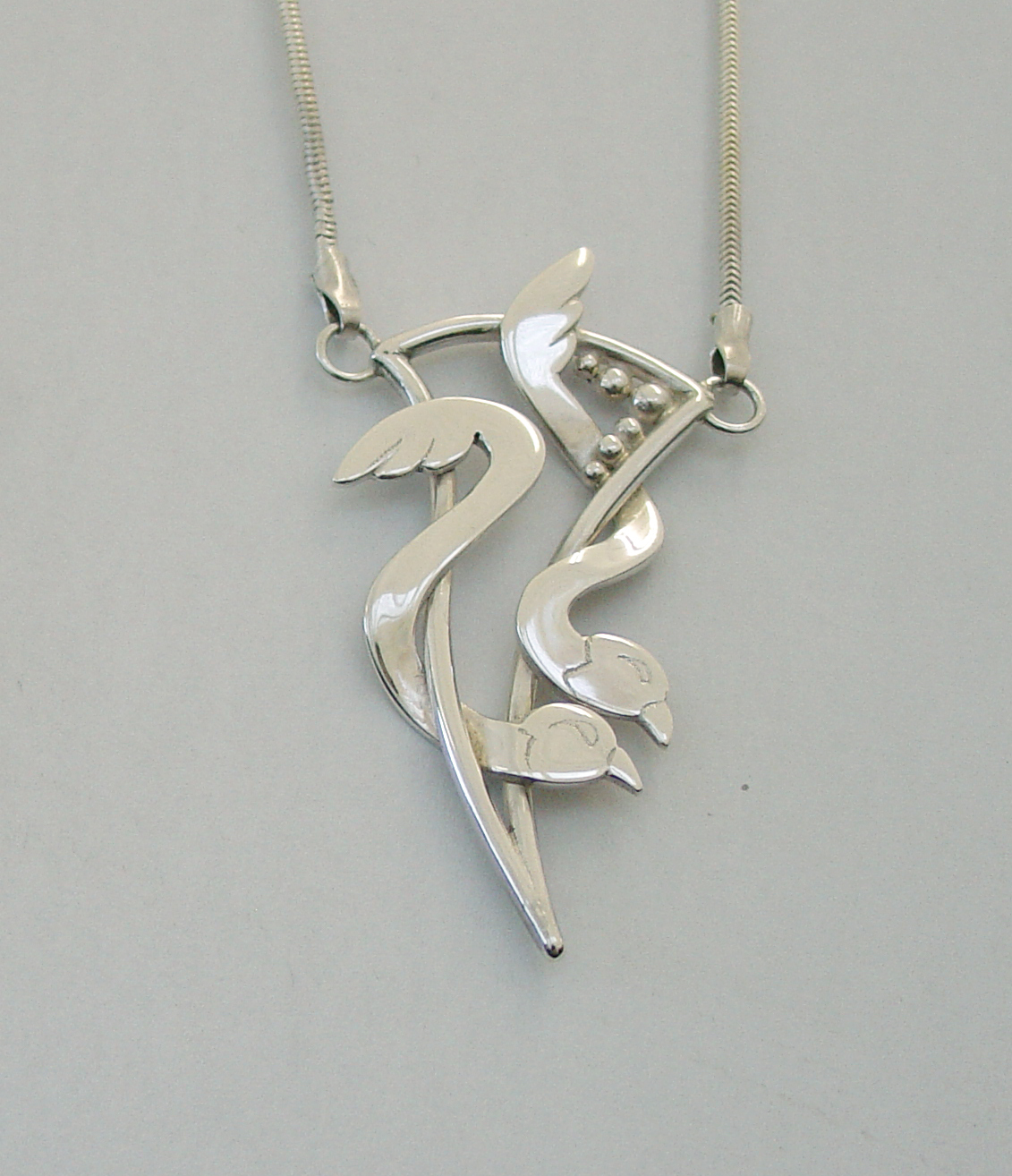 Silver birds pendant