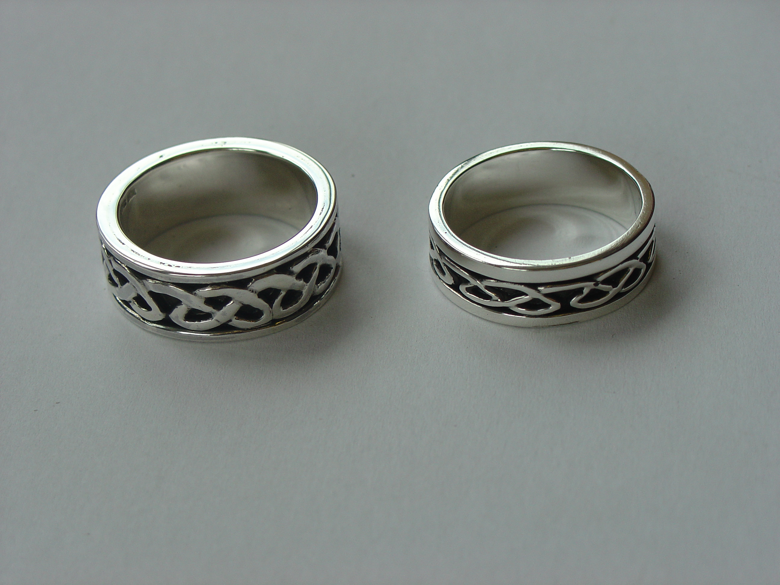 Silver bands with cut out knot work