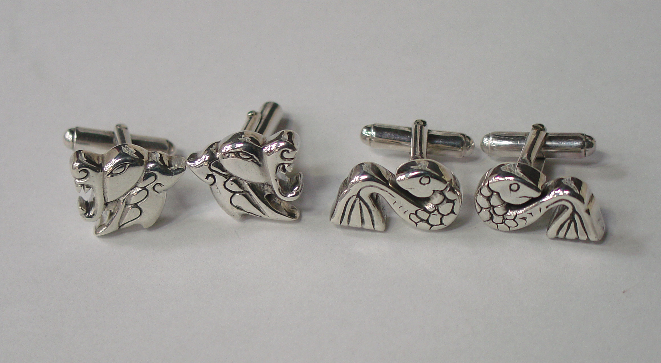 Beast and fish cufflinks