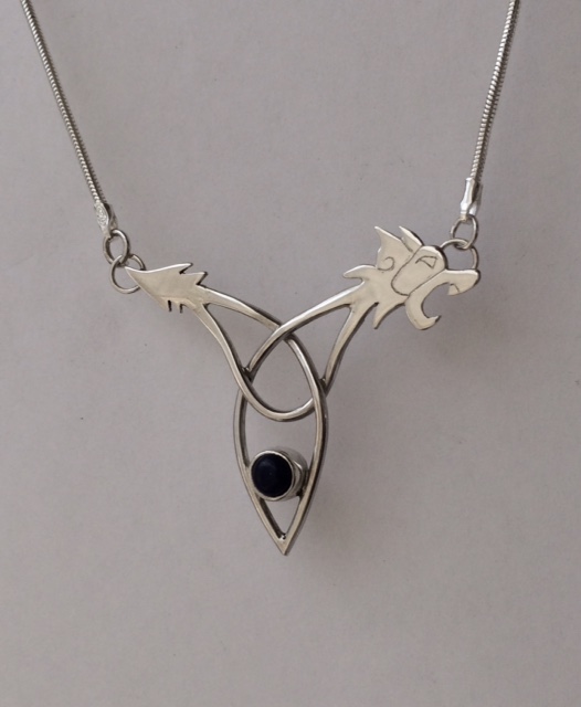 Wild beast with lapis lazuli pendant
