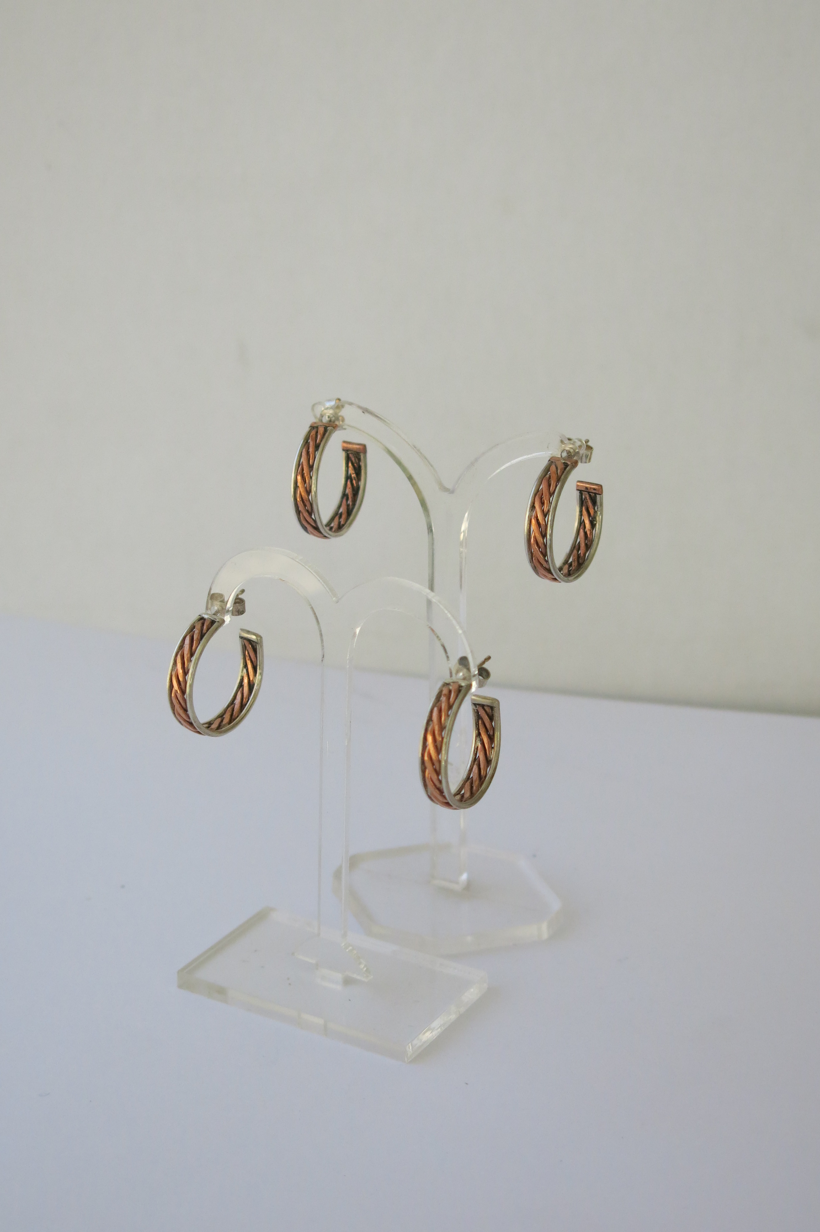 Silver and copper/brass twist stud fastening earrings
