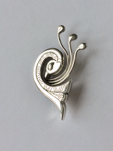 Silver bird brooch