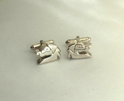 One off cast dog head cufflinks