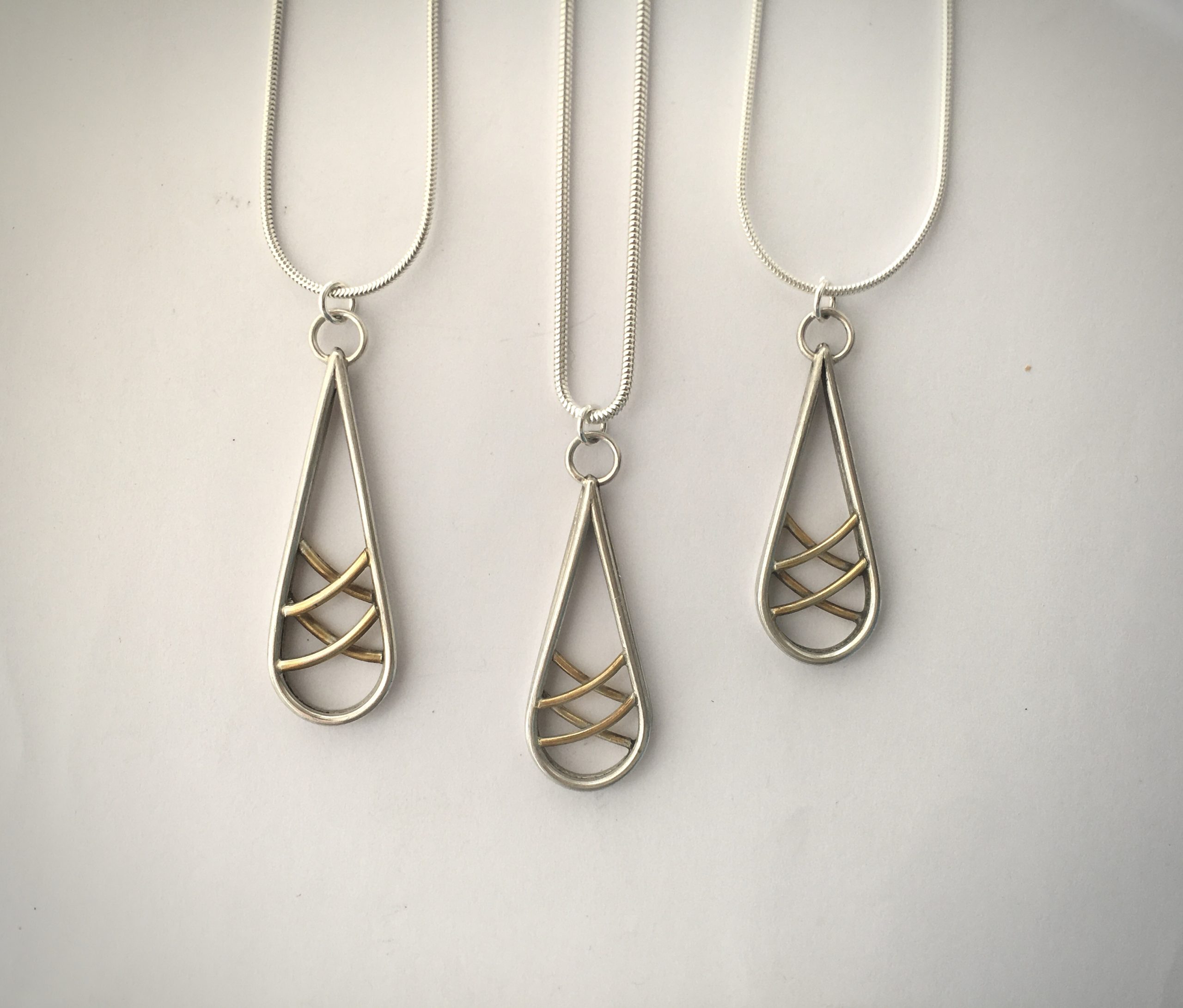 Silver lattice pendant with gold plate 