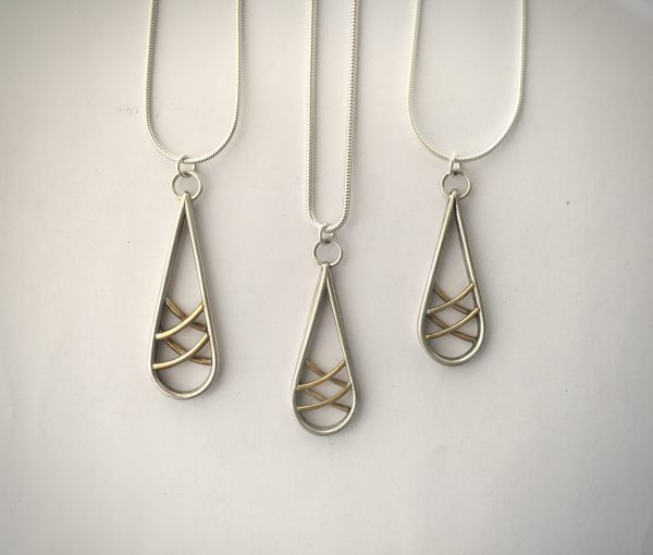 Silver lattice pendant with gold plate 