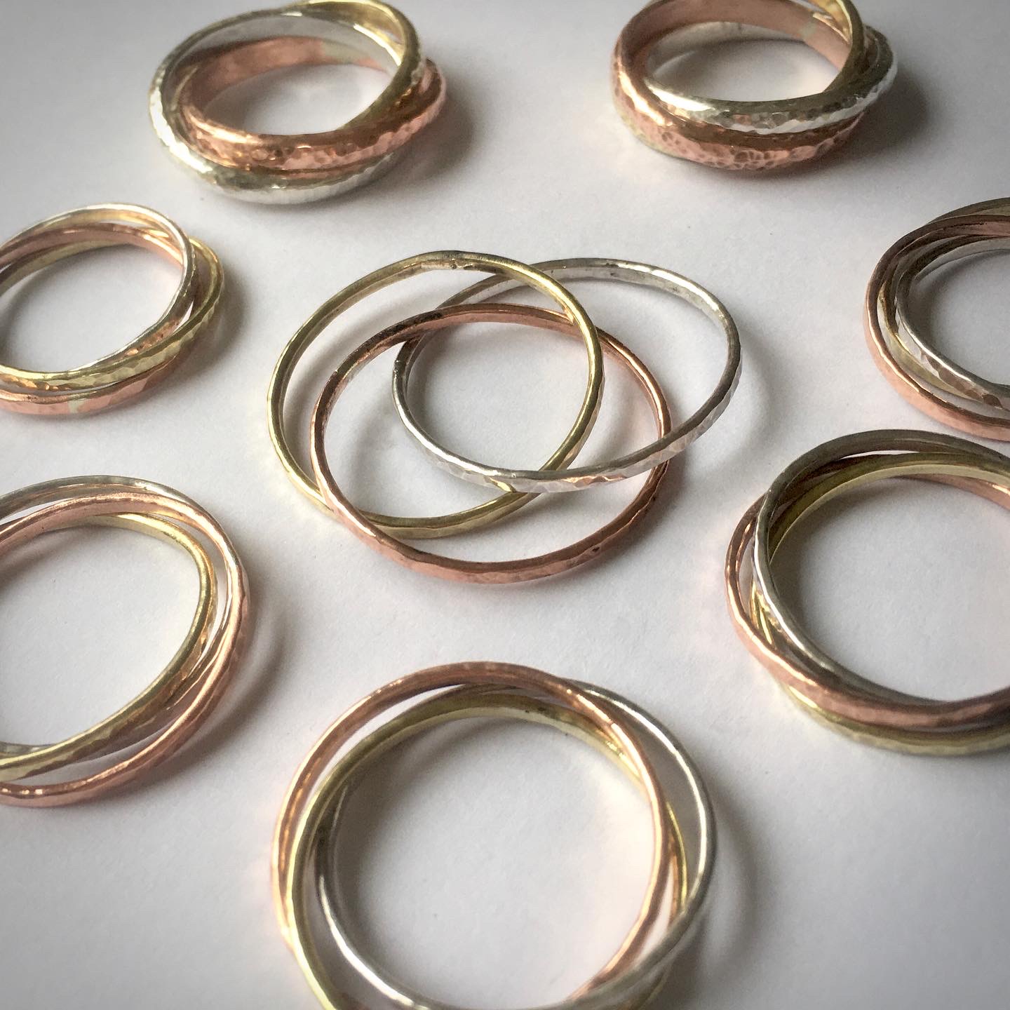 Silver, copper and brass interlocking rings